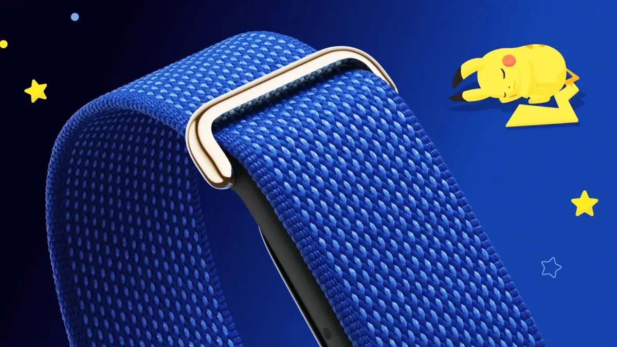 Fitbit Air Pokémon Sleep Special Edition dengan gelang biru dan ikon Pikachu