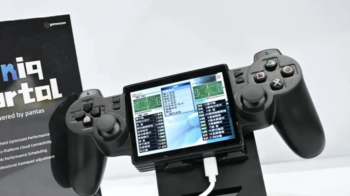 Yoniq Portal handheld bergaya kontroler DualShock 2 dengan layar kecil untuk game retro