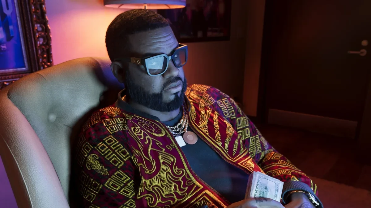 Boobie Ike memegang uang dalam cuplikan gim GTA 6 dari Rockstar Games