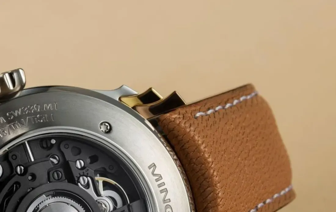 Konstruksi lug tiga tingkat pada jam tangan MING